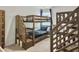 ' bedroom with bunkbeds featuring unique wooden stairs leading to the top bunk, offering a fun and practical design at 5003 Ferry Field Dr, Summerville, SC 29485