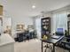 Bright home office features desks, chairs, storage, and a window with natural light, perfect for remote work and study at 5003 Ferry Field Dr, Summerville, SC 29485
