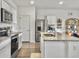 Beautiful kitchen featuring a center island, granite countertops, and stainless steel appliances at 5003 Ferry Field Dr, Summerville, SC 29485