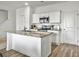 Kitchen featuring an island with granite countertops and stainless steel appliances at 5003 Ferry Field Dr, Summerville, SC 29485