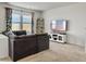 Comfortable living room featuring a large sectional sofa, plush carpet, and a media center at 5003 Ferry Field Dr, Summerville, SC 29485