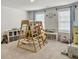 Spacious playroom with natural light, a wooden playset, and plenty of storage at 5003 Ferry Field Dr, Summerville, SC 29485