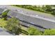 An aerial view of townhomes with a parking lot, green space, and fenced in patios at 506 Arlington Dr # F, Charleston, SC 29414