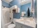 Cozy bathroom features a shower and tub combination with a white vanity and sink at 506 Arlington Dr # F, Charleston, SC 29414