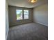 Bedroom with carpeted floor and large windows at 5100 Double Eagle, Summerville, SC 29485