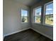 Bright bedroom featuring wood floors, neutral walls, and large windows offering natural light at 5100 Double Eagle, Summerville, SC 29485