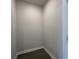 Spacious empty closet with dark floors and white trim at 5100 Double Eagle, Summerville, SC 29485
