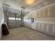 Spacious garage with overhead door and basic ceiling light at 5100 Double Eagle, Summerville, SC 29485