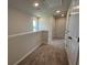 Upstairs hallway featuring carpet and white doors at 5100 Double Eagle, Summerville, SC 29485