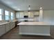 Open concept kitchen boasts stainless appliances, a large island, and ample cabinet space at 5100 Double Eagle, Summerville, SC 29485