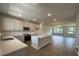 Open concept kitchen boasts stainless appliances, a large island, and ample cabinet space at 5100 Double Eagle, Summerville, SC 29485