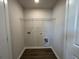 Laundry room featuring a metal rack for drying and dark wood flooring at 5100 Double Eagle, Summerville, SC 29485