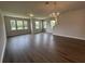 Spacious living room with wood floors and large bright windows at 5100 Double Eagle, Summerville, SC 29485