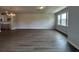 Open concept living area with hardwood floors and a view of the kitchen at 5100 Double Eagle, Summerville, SC 29485