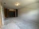 Spacious unfinished room with installed insulation, drywall, and basic ceiling light fixture at 5100 Double Eagle, Summerville, SC 29485