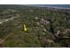 An aerial view shows the property's proximity to a golf course and the beach at 5504 Green Dolphin Way, Kiawah Island, SC 29455