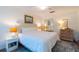 Comfortable primary bedroom with a ceiling fan and decor at 5504 Green Dolphin Way, Kiawah Island, SC 29455