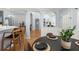 Open-concept dining area with seamless transition to kitchen and living spaces, light and airy at 569 Pointe Of Oaks Rd, Summerville, SC 29485