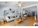 Cozy living room with light walls, hardwood floors, and elegant decor at 569 Pointe Of Oaks Rd, Summerville, SC 29485
