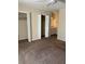 Comfortable bedroom featuring a fan and double closets and access to ensuite bath at 6 Town Park Ln # C, Charleston, SC 29412