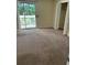 Bedroom featuring a sliding glass door to balcony and double door closet at 6 Town Park Ln # C, Charleston, SC 29412