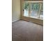 Cozy bedroom with large mulled windows for ample natural light at 6 Town Park Ln # C, Charleston, SC 29412