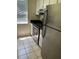 Functional kitchen featuring stainless appliances, ample cabinet space, and tile flooring at 6 Town Park Ln # C, Charleston, SC 29412