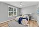Bright bedroom with natural light, ceiling fan, and a large window with view at 60 Fenwick Hall Aly # 415, Johns Island, SC 29455