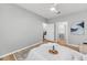 View of bedroom with wood-look floors, ceiling fan, ensuite laundry and a walk-in closet at 60 Fenwick Hall Aly # 415, Johns Island, SC 29455