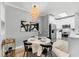 Dining room featuring table with four chairs and a view of the kitchen at 60 Fenwick Hall Aly # 415, Johns Island, SC 29455