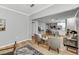 Open-concept living area with modern decor and seamless flow to the kitchen and dining space at 60 Fenwick Hall Aly # 415, Johns Island, SC 29455