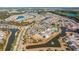 Aerial view of the community amenities including the clubhouse, pool, ponds and community layout at 626 Battery Edge Dr, Summerville, SC 29486