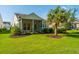 Charming home with a screened in porch and palm trees at 626 Battery Edge Dr, Summerville, SC 29486