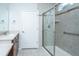 Tiled shower and double sinks highlight this bathroom at 626 Battery Edge Dr, Summerville, SC 29486
