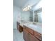 Bathroom features a double sink vanity with neutral countertops and modern lighting at 626 Battery Edge Dr, Summerville, SC 29486