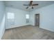 Bedroom with carpet flooring, modern ceiling fan, natural lighting, and en suite bathroom at 626 Battery Edge Dr, Summerville, SC 29486