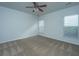 Bedroom with carpet flooring, modern ceiling fan, and natural lighting at 626 Battery Edge Dr, Summerville, SC 29486