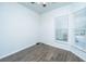 This bedroom features a wood floor, ceiling fan, and a window at 626 Battery Edge Dr, Summerville, SC 29486