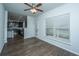 Open dining area features hardwood floors, natural light, and modern ceiling fan at 626 Battery Edge Dr, Summerville, SC 29486