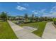 A dedicated lawn bowling area with shade coverings and a central seating area at 626 Battery Edge Dr, Summerville, SC 29486