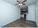 Open living room features hardwood flooring, natural light, and flows into kitchen at 626 Battery Edge Dr, Summerville, SC 29486