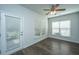 Bright sun room features hardwood floors, natural lighting, and exterior door at 626 Battery Edge Dr, Summerville, SC 29486