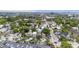 Aerial view of a neighborhood featuring a mix of residential homes and green spaces at 634 Rutledge Ave, Charleston, SC 29403