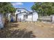 Backyard with mature trees and space for recreation or gardening at 634 Rutledge Ave, Charleston, SC 29403