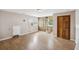 Spacious bedroom with hardwood floors and windows allowing for ample natural light at 634 Rutledge Ave, Charleston, SC 29403