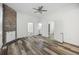 Sunlit bedroom with fresh paint, durable floors, and easy access to other rooms at 634 Rutledge Ave, Charleston, SC 29403