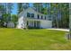 Two story home with a large yard, shed, and beautiful landscaping at 689 W Butternut Rd, Summerville, SC 29483