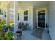 Charming front porch with ample seating and welcoming decor at 689 W Butternut Rd, Summerville, SC 29483