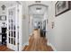 Inviting hallway with hardwood floors and stylish decor throughout at 689 W Butternut Rd, Summerville, SC 29483