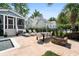 Spacious patio with outdoor dining and lounge furniture with access to a pool and yard at 6910 Tanner Hall Blvd, Hanahan, SC 29410